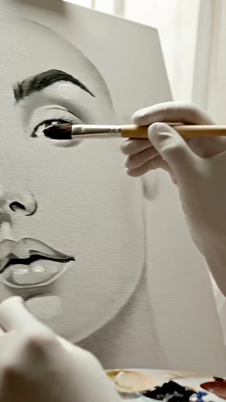 Match cut — brush stroke to syringe movement